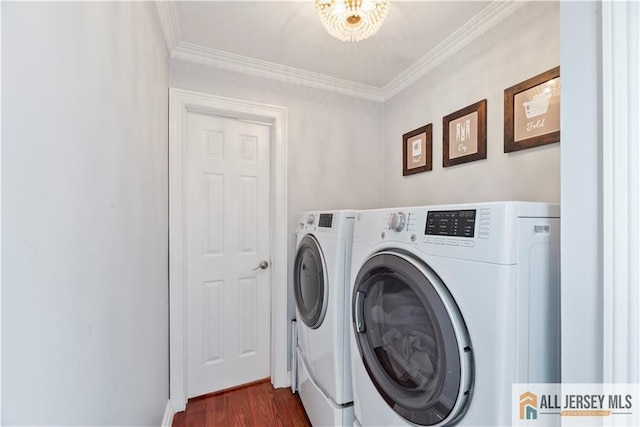 43 S Brook Dr, Milltown, NJ 08850 - laundry area featuring washing machine and clothes dryer, crown molding, and dark wood-type flooring