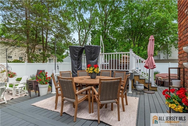 43 S Brook Dr, Milltown, NJ 08850 - wooden deck featuring outdoor dining area and a fenced backyard