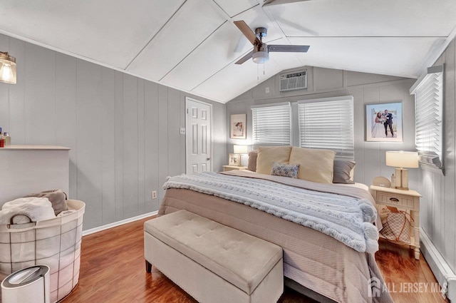 220 Birchwood Dr, Old Bridge, NJ 07735 - bedroom featuring wood finished floors, lofted ceiling, baseboards, a decorative wall, and ceiling fan