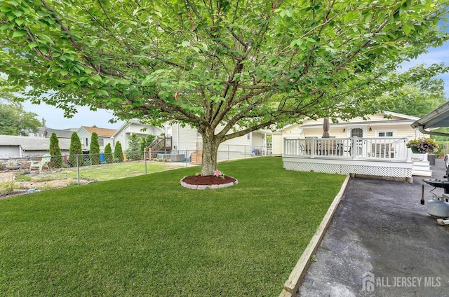 220 Birchwood Dr, Old Bridge, NJ 07735 - view of yard featuring a deck