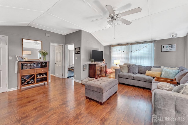 220 Birchwood Dr, Old Bridge, NJ 07735 - living room featuring lofted ceiling, a ceiling fan, and wood finished floors