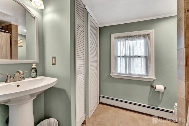 220 Birchwood Dr, Old Bridge, NJ 07735 - bathroom featuring a baseboard radiator, a closet, crown molding, toilet, and a sink