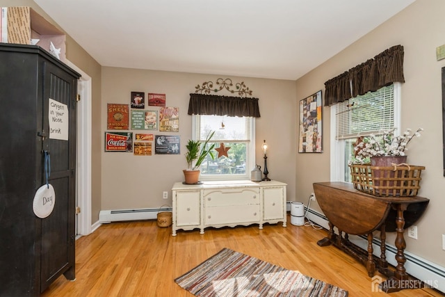 245 S Madison Ave S, Dunellen, NJ 08812 - foyer featuring baseboard heating and light wood finished floors
