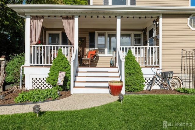 245 S Madison Ave S, Dunellen, NJ 08812 - entrance to property featuring a porch