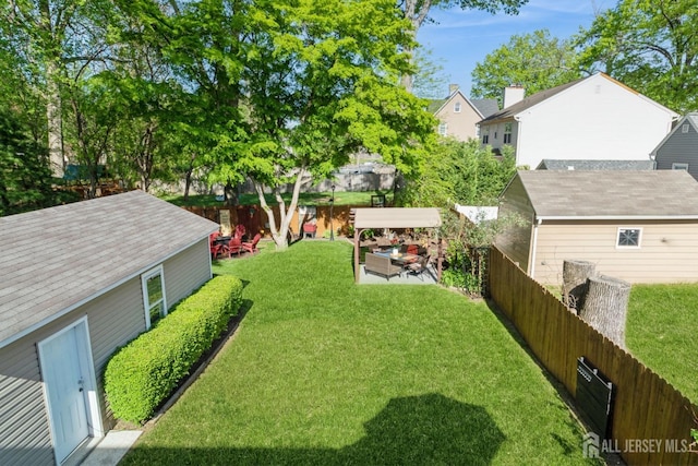 245 S Madison Ave S, Dunellen, NJ 08812 - fenced backyard with outdoor lounge area and a patio