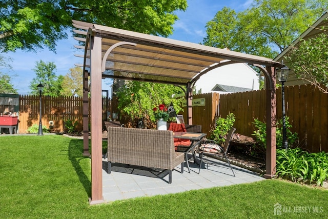 245 S Madison Ave S, Dunellen, NJ 08812 - fenced backyard with a patio and outdoor dining space