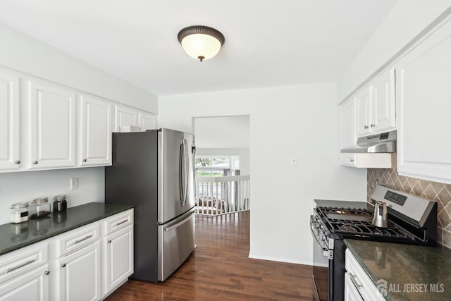 2 Honey Locust Ln, Howell, NJ 07731 - kitchen with appliances with stainless steel finishes, under cabinet range hood, tasteful backsplash, white cabinets, and dark wood-style flooring