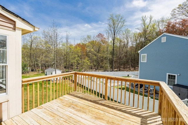 2 Honey Locust Ln, Howell, NJ 07731 - wooden deck featuring a storage unit and a fenced backyard