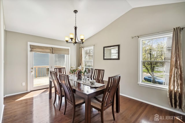 2 Honey Locust Ln, Howell, NJ 07731 - dining room with a chandelier, lofted ceiling, and dark wood-type flooring