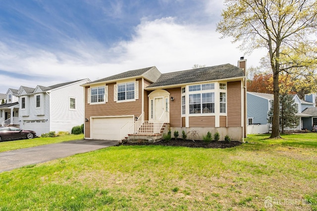 2 Honey Locust Ln, Howell, NJ 07731 - split level home featuring a chimney, asphalt driveway, a garage, and a front lawn