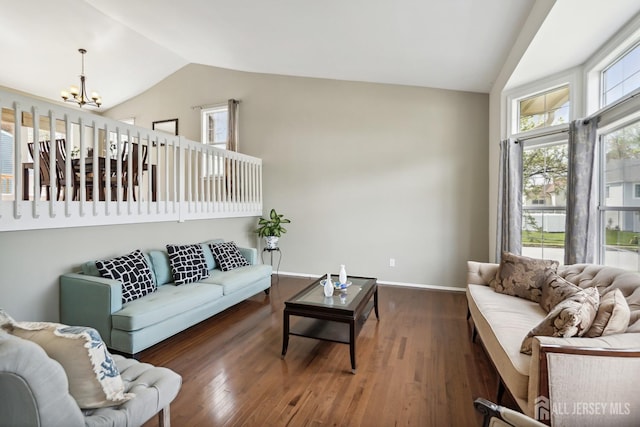 2 Honey Locust Ln, Howell, NJ 07731 - living room with vaulted ceiling, a chandelier, and wood finished floors