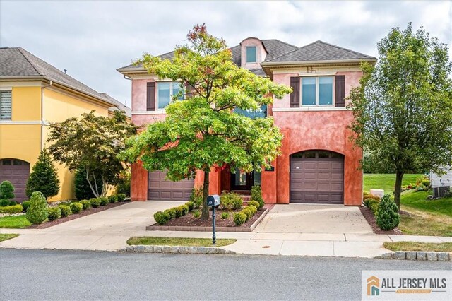 view of front of property featuring a garage