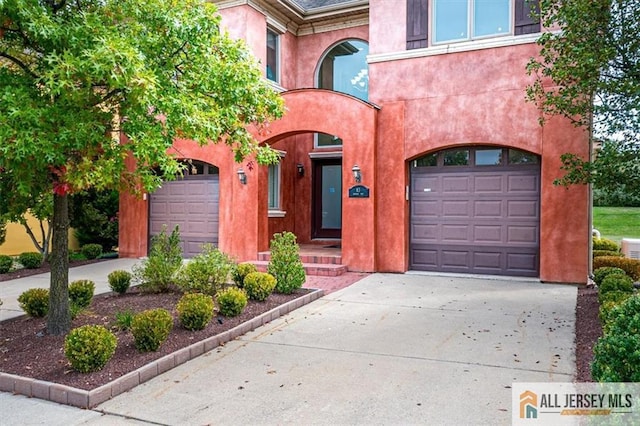 view of front of home with a garage