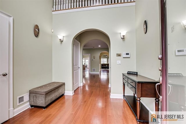 hallway with light wood-type flooring