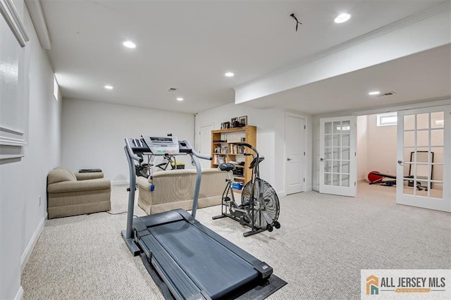 workout room with light carpet and french doors