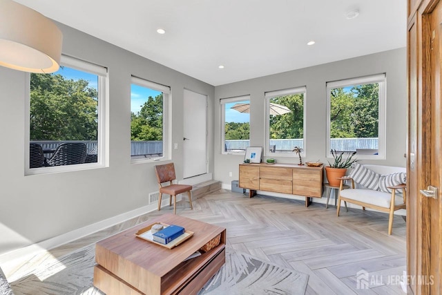 sunroom featuring plenty of natural light