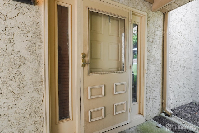 14 Carriage Pl, Edison, NJ 08820 - view of exterior entry with stucco siding