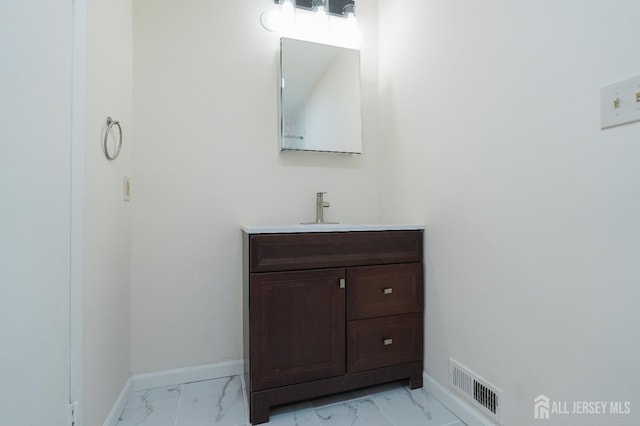 14 Carriage Pl, Edison, NJ 08820 - bathroom with marble look tile flooring and vanity
