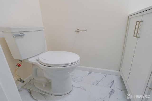 14 Carriage Pl, Edison, NJ 08820 - bathroom with marble look tiles and toilet