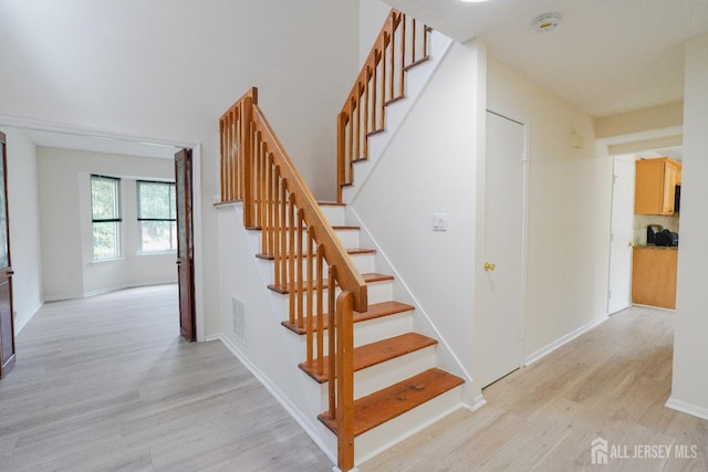 14 Carriage Pl, Edison, NJ 08820 - stairway featuring wood finished floors and baseboards