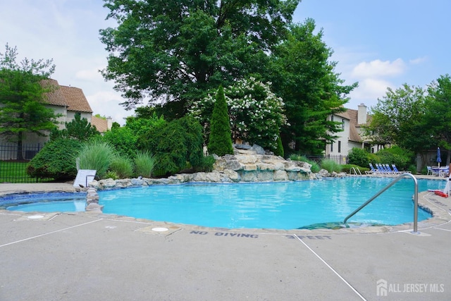 14 Carriage Pl, Edison, NJ 08820 - community pool featuring a patio