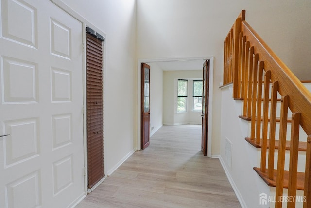 14 Carriage Pl, Edison, NJ 08820 - corridor featuring light wood-type flooring and stairway