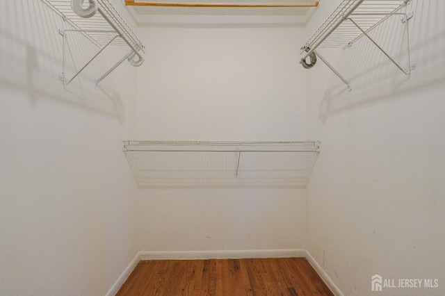 14 Carriage Pl, Edison, NJ 08820 - spacious closet featuring wood finished floors