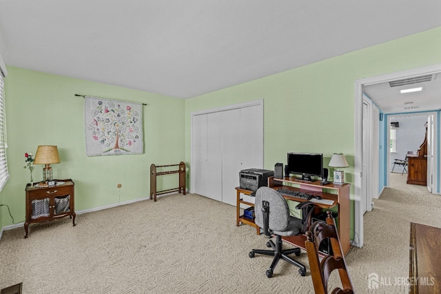 office with carpet, visible vents, and baseboards