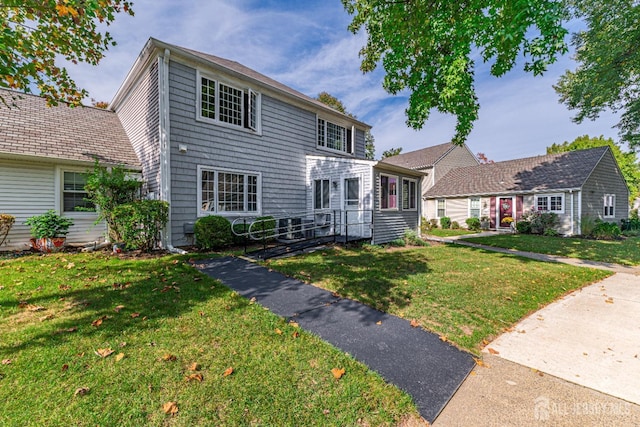 view of front of house with a front lawn