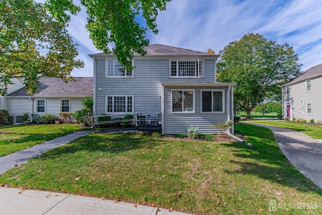 view of front of property with a front lawn