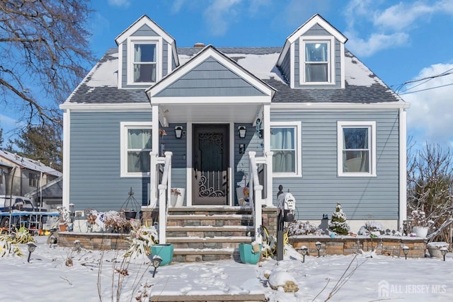 view of new england style home