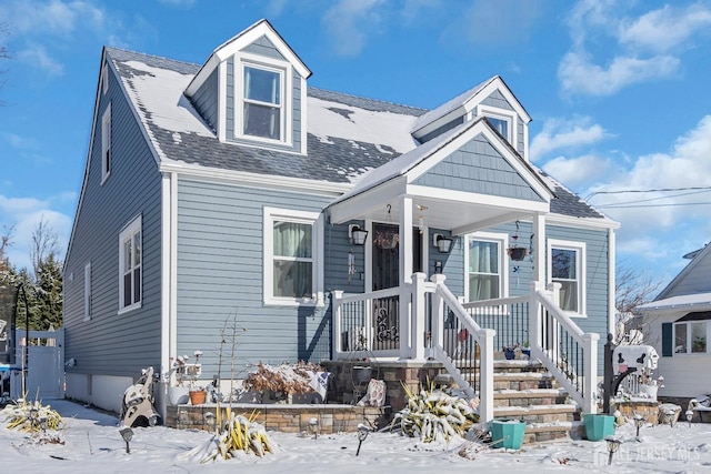 view of front of house featuring a shingled roof