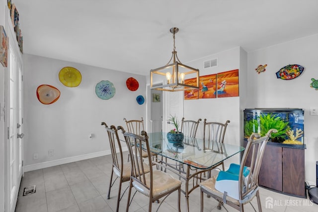 dining space with a chandelier