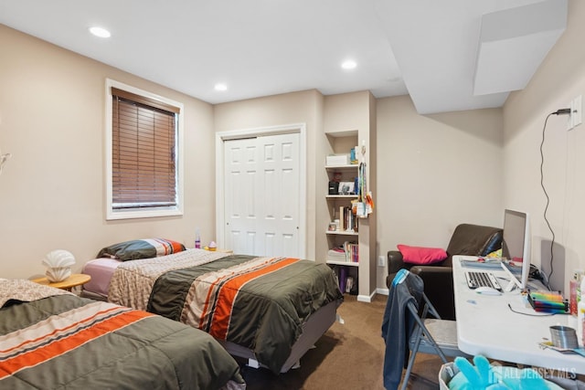 carpeted bedroom with a closet, baseboards, and recessed lighting