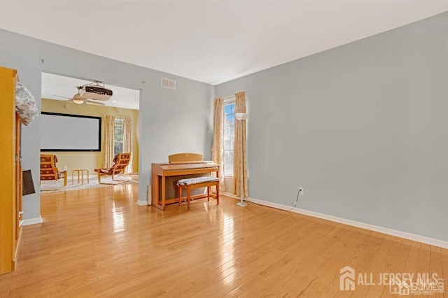 65 Cortland Dr, East Brunswick, NJ 08816 - empty room featuring light wood finished floors and a ceiling fan