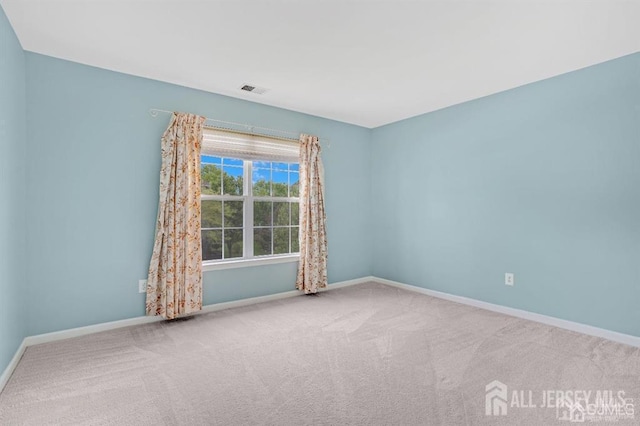 65 Cortland Dr, East Brunswick, NJ 08816 - spare room featuring baseboards and carpet flooring