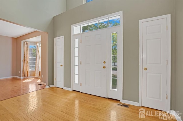 65 Cortland Dr, East Brunswick, NJ 08816 - foyer with light wood-type flooring and baseboards