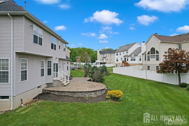 65 Cortland Dr, East Brunswick, NJ 08816 - view of yard featuring a residential view and a patio area