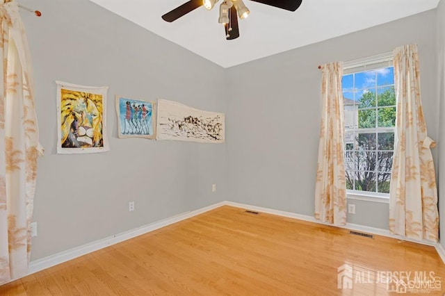 65 Cortland Dr, East Brunswick, NJ 08816 - spare room featuring ceiling fan and wood finished floors