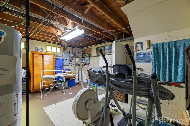 basement featuring gas water heater and electric panel