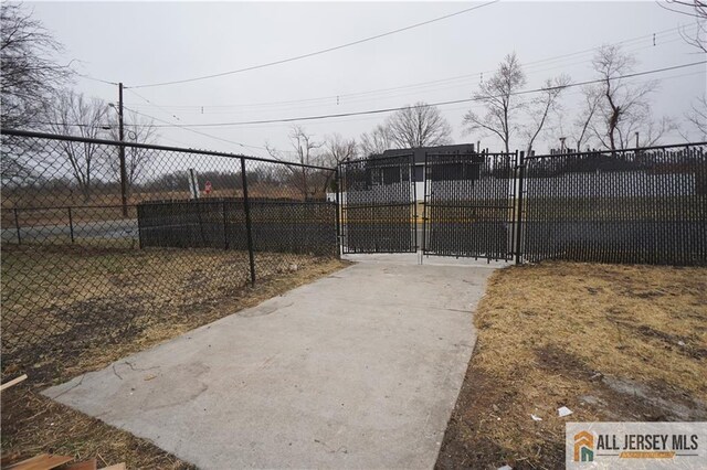 15 Wedgewood Ave, Woodbridge Proper, NJ 07095 - view of gate featuring fence