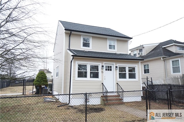 view of front of home featuring central air condition unit, roof with shingles, fence private yard, and entry steps