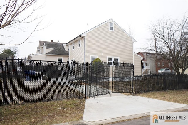 exterior space featuring a fenced front yard