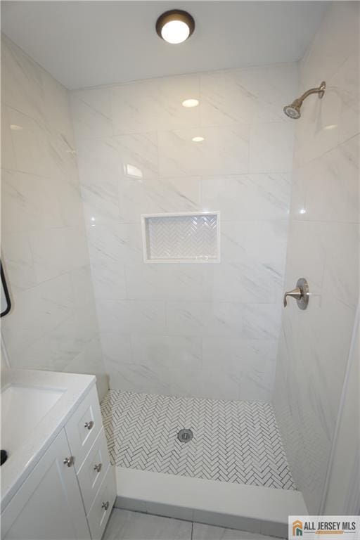 15 Wedgewood Ave, Woodbridge Proper, NJ 07095 - bathroom featuring a tile shower and vanity