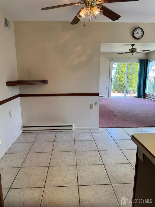 93 Mansfield Ave, Manchester, NJ 08579 - unfurnished room featuring baseboard heating, ceiling fan, light tile patterned floors, and light carpet