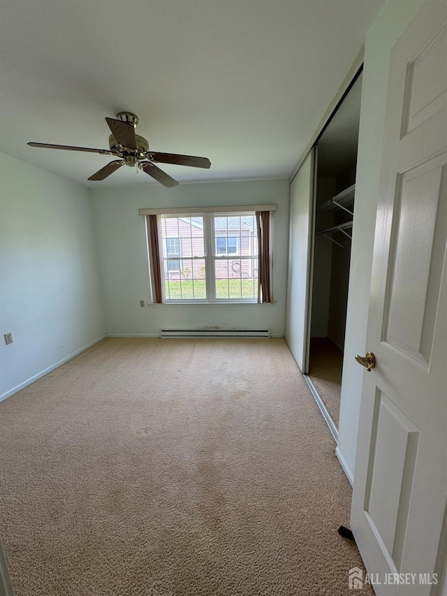 93 Mansfield Ave, Manchester, NJ 08579 - unfurnished bedroom with light colored carpet, a baseboard radiator, a closet, and ceiling fan