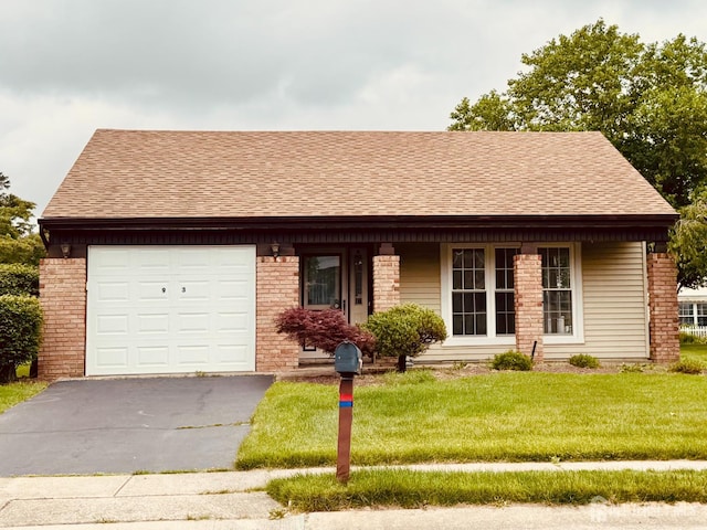 93 Mansfield Ave, Manchester, NJ 08579 - view of front facade with a garage, driveway, a shingled roof, a front lawn, and brick siding