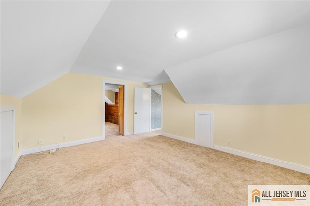 bonus room with vaulted ceiling, carpet, recessed lighting, and baseboards