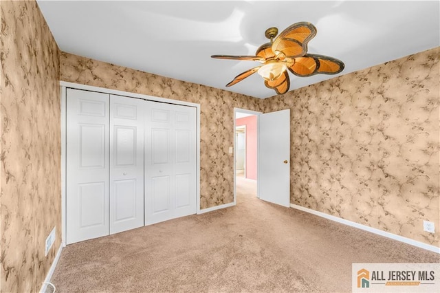 8 Farmbrook Dr, Old Bridge, NJ 08857 - unfurnished bedroom with carpet floors, a closet, ceiling fan, and wallpapered walls
