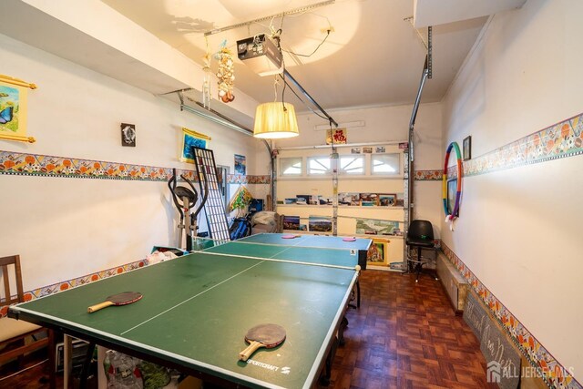 game room featuring dark parquet floors